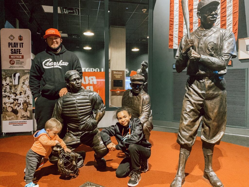 An exhibit with statues of famous players at the Negro Leagues Baseball Museum.
