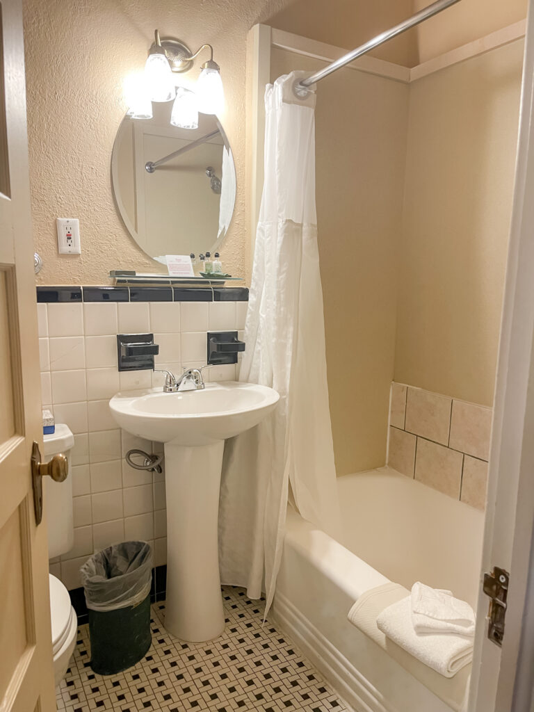 a view of the bathroom in a classic queen room at the hotel colorado