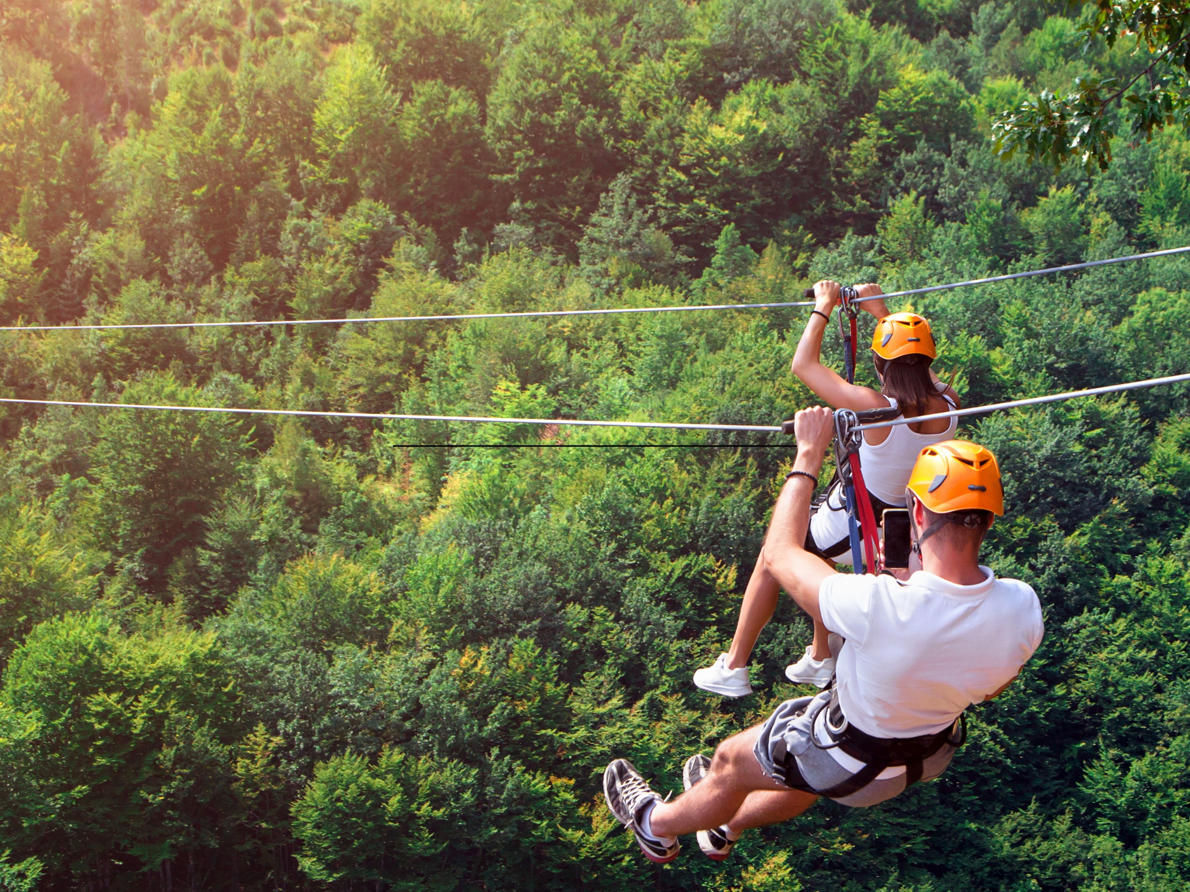 ziplining through the jungle is the perfect activity for families while vacationing in Maui