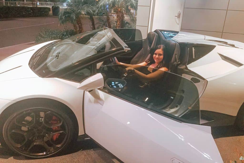 woman driving a Lamborghini in Vegas