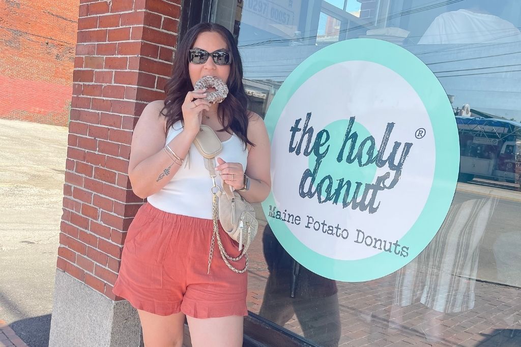 girl eating a donut